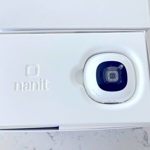 Nanit + baby monitor and sleep tracker. Includes wall mount and 2 waist bands